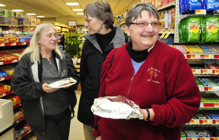 Solon Selectwomen, from left, Elaine Aloes, Sarah Davis and Mary Lou Ridley, showed up at the reopened Solon Corner Market to buy lunch and offer support to the new owners on March 23, 2016. Ridley retired this year after 20 years on the board.