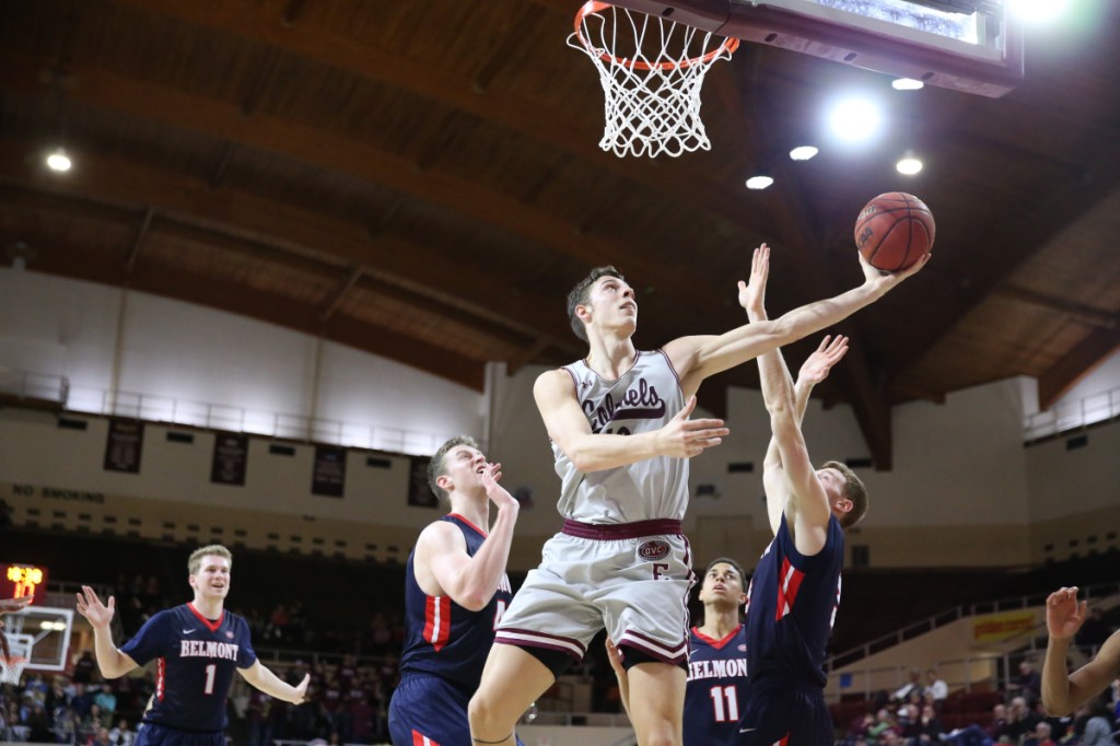 Eastern Kentucky junior Nick Mayo goes up for a shot during a game against Belmont earlier this season. Mayo, a Messalonskee High School graduate, is contemplating his collegiate future.