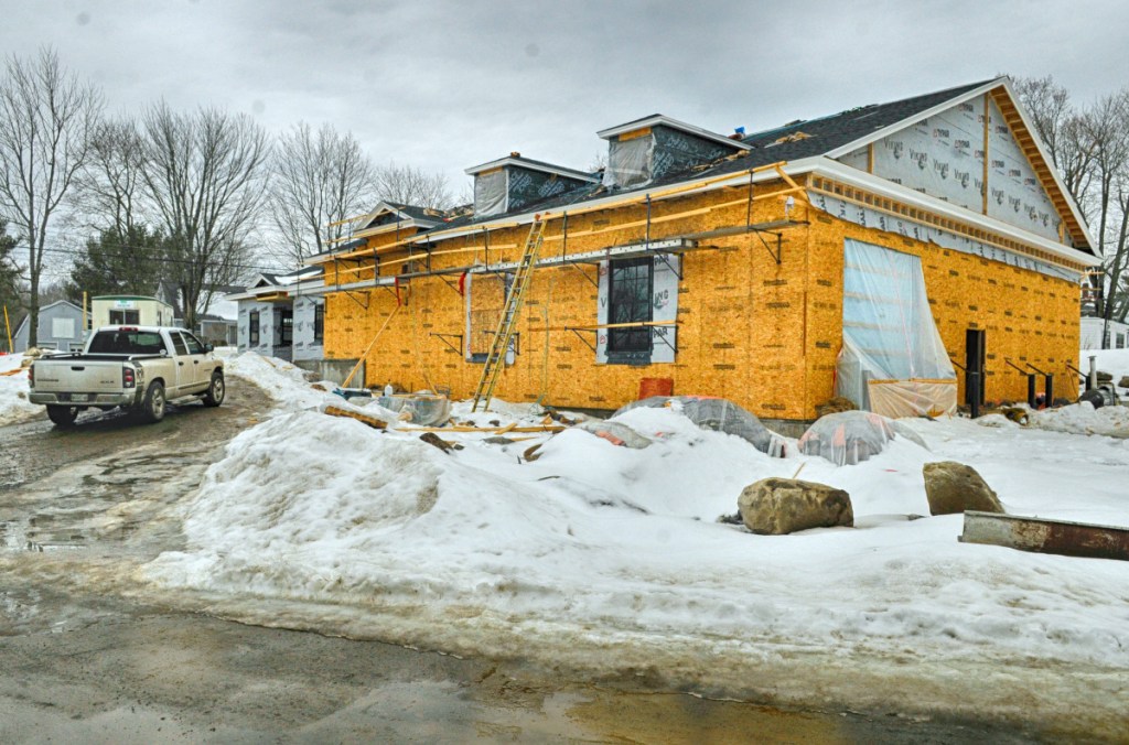 The new firehouse is under construction in Hallowell, where blue insulation covers the opening that will be one of the three truck bay doors.