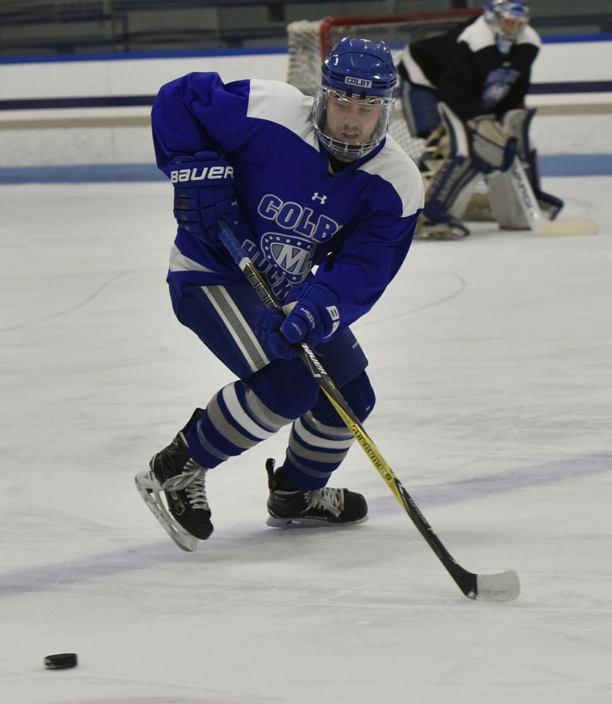 Colby College captain Cam MacDonald skates during practice Tuesday in Waterville.
