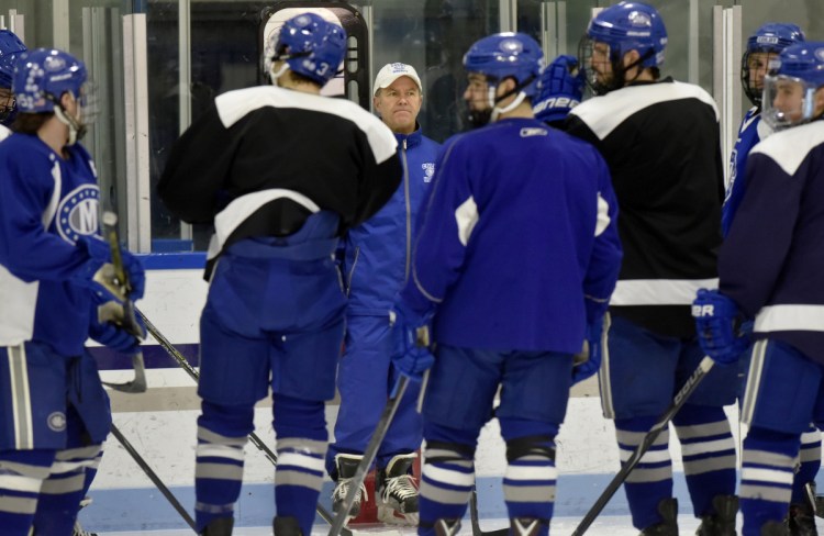 Colby College hockey coach Blaise MacDonald addresses the team during practice this week at Alfond Rink in Waterville. The team is playing at the University of New England in the NCAA tournament on Saturday.