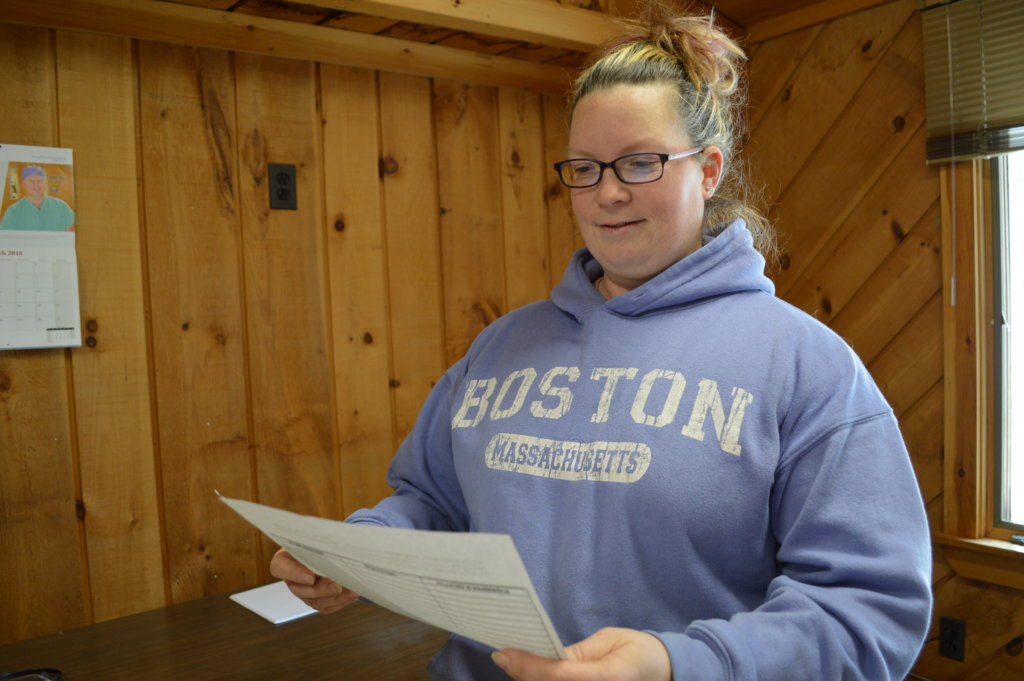 Tiffany Estabrook, of Chesterville, is working with others to collect voters' signatures on a petition asking the state commissioner of education to determine the reapportionment of the Regional School Unit 9 board of directors.