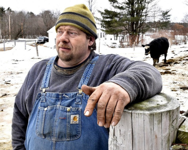 Clayton Tibbetts talks in February about the discovery and loss of a 4-year-old pregnant Angus beef cow named Fluffy that he found shot to death in a pasture at his farm in Madison. Tibbetts closed the trail on his property to snowmobiling but has since reopened it.