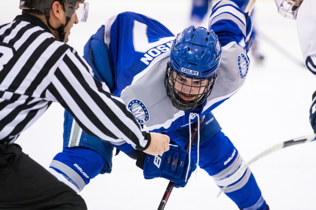 Colby College freshman Spencer Hewson prepares to take a faceoff in an NCAA tournament game last weekend against SUNY Geneseo in Geneseo, New York.