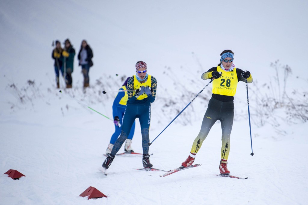 Staff file photo by Michael G. Seamans 
 Maranacook's Laura Parent (28) leads Mt Blue's Meg Charles, left, and Morse's Jenny Wilbraham in the Cougar Soft 7 race earlier this winter at Titcomb Mountain in Farmington.