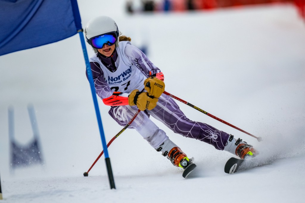 Mt. Blue's Ellie Pelletier skis the lower part of the giant slalom course during  her second run at the class A alpine championships earlier this season at Mt. Abram in Greenwood.