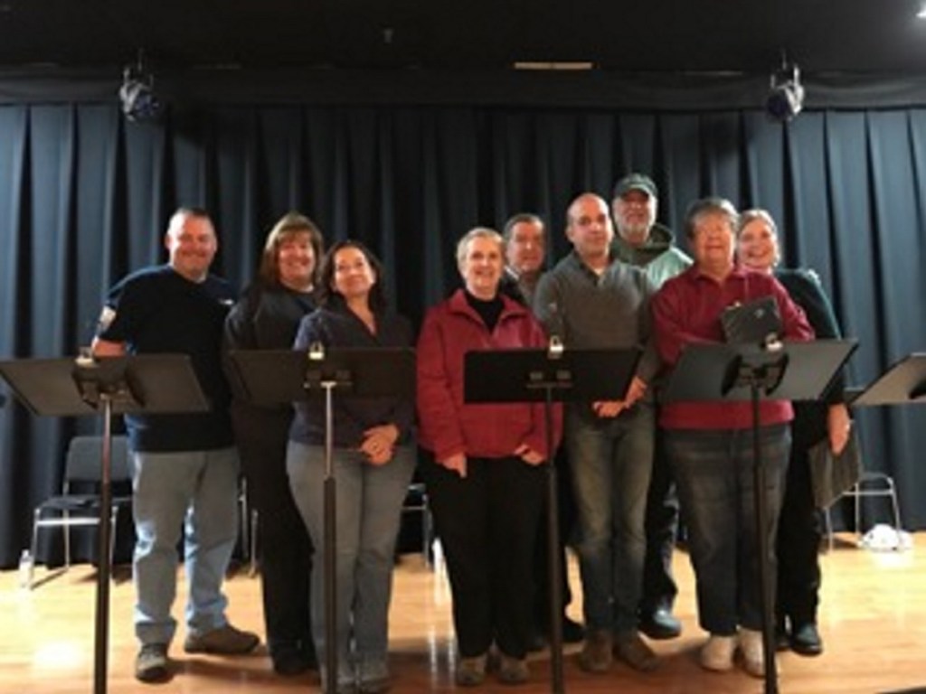 Cast members of "The World of Carl Sandburg," from left, are Arthur Bourget, Kathy Kauffman, Cindy Turcotte, Ginger Smith, Frank Omar, David Moisan, Bill Haley, Christine Heckman, and Connie LaFlamme.