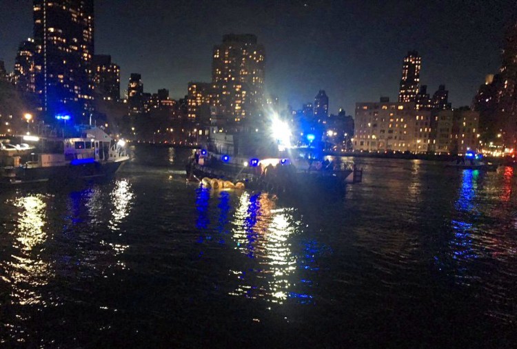 This image made from video shows the scene of the helicopter crash in the East River Sunday night. 