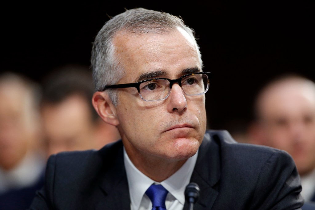 FBI acting director Andrew McCabe listens during a Senate Intelligence Committee hearing about the Foreign Intelligence Surveillance Act on June 7, 2017, on Capitol Hill in Washington. The Justice Department is reviewing a recommendation that it fire former FBI Deputy Director Andrew McCabe ahead of his forthcoming retirement. That’s according to a person familiar with the matter, who spoke on condition of anonymity to discuss an internal disciplinary process. The recommendation was made by the FBI’s Office of Professional Responsibility and was sent to the Justice Department.  
