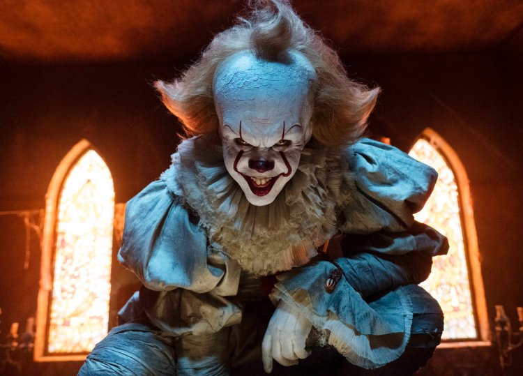 This image released by Warner Bros. Pictures shows Bill Skarsgard as the evil clown Pennywise in a scene from the film "It," based on the book by Stephen King. 