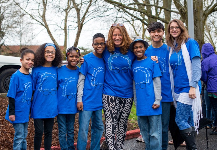 This March 20, 2016, photo shows Hart family of Woodland, Wash., at a Bernie Sanders rally in Vancouver, Wash.  Authorities in Northern California say they believe all six children from a family were in a vehicle that plunged off a coastal cliff. 