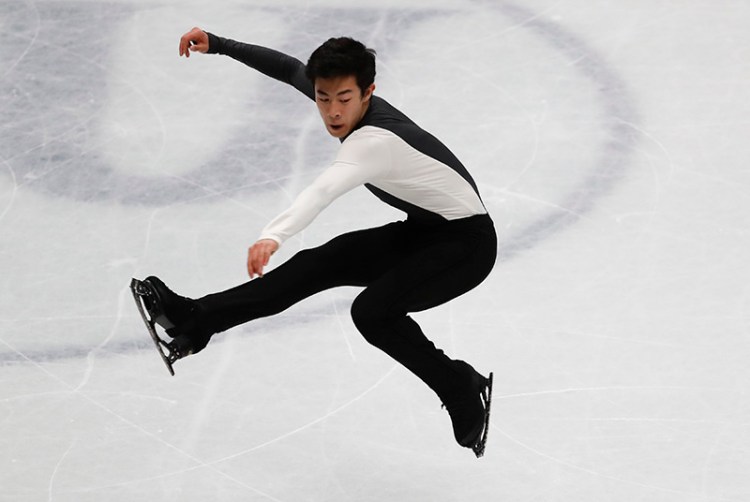 Nathan Chen performs during men's short program at the Figure Skating World Championships in Assago, Italy.