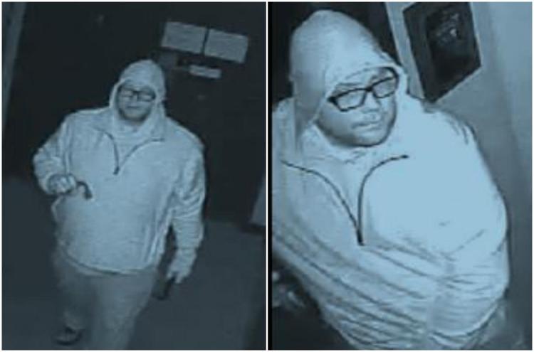 The suspect is described as a heavyset white man wearing dark-rimmed glasses. He was dressed in dark clothing, including gloves. His sweatshirt appears light in security video images because of the night-vision aspect of the cameras. 