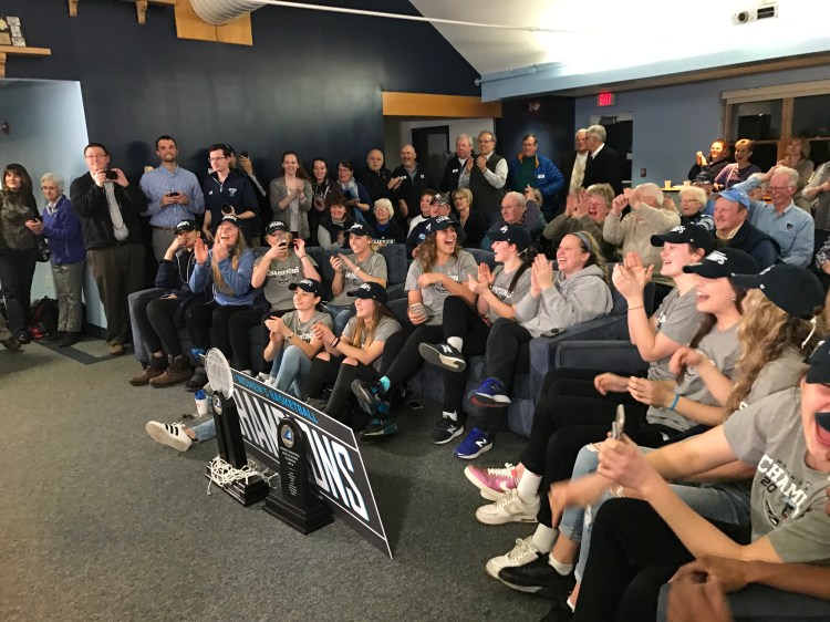 The University of Maine women's basketball team reacts Monday after it was announced it would face Texas in the first round of the NCAA women's basketball tournament.