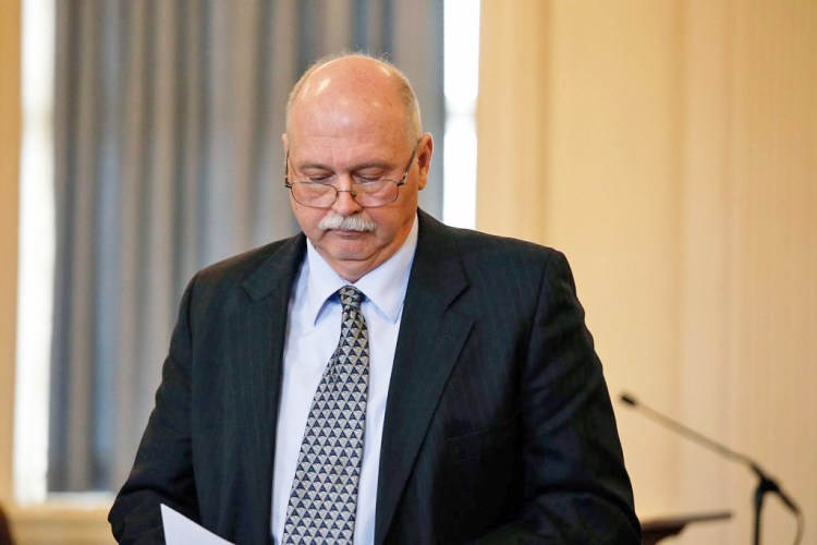 Ricky Plummer, former fire chief for Old Orchard Beach, approaches a podium to read a statement to the judge during a sentencing hearing on Wednesday at York County Court House in Alfred. Plummer was sentenced to nine years in prison, with all but 1 year suspended, and four years of probation.