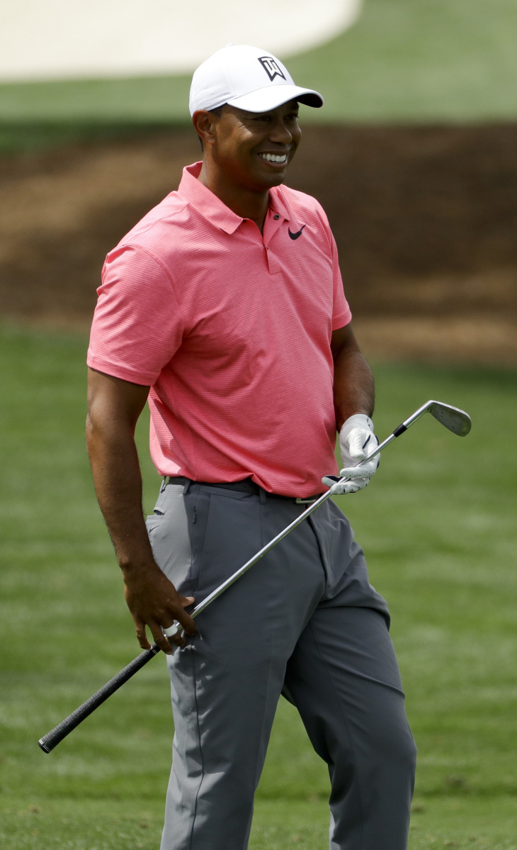Tiger Woods returned to Augusta National on Monday for a practice round and will play in The Masters for the first time since 2015.