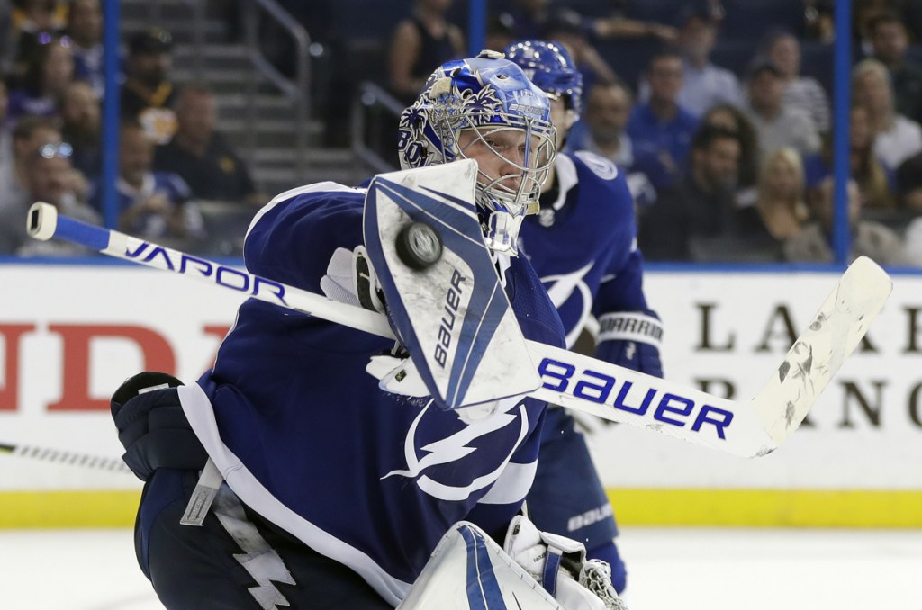 Tampa Bay Lightning goaltender Andrei Vasilevskiy makes a blocker save in the third period of Tuesday's game in Tampa, Fla. The Lightning won the game 4-0.