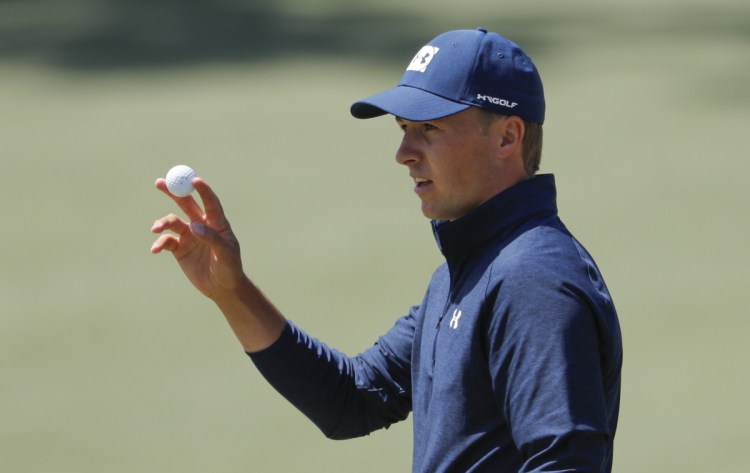 Jordan Spieth shot a 66 on Thursday in the first round of the Masters in Augusta, Ga. to give himself a two-shot lead.