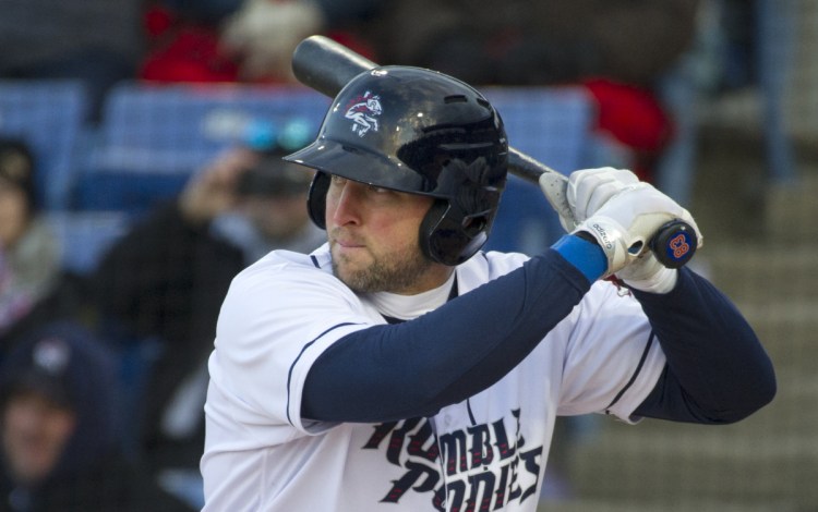 Tim Tebow, playing for the Binghamton Rumble Ponies, prepares to bat in the first inning against the Portland Sea Dogs in a season-opening game on Thursday in Binghamton, N.Y. Tebow homered on the first pitch he faced.