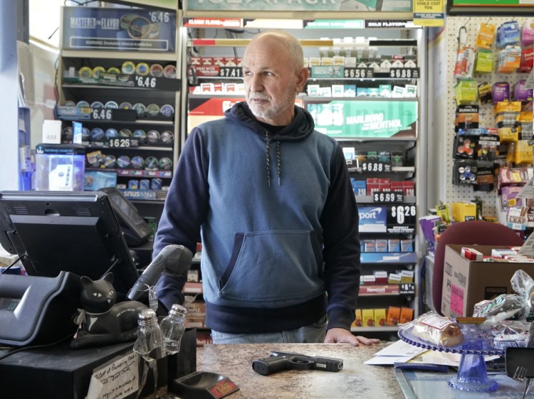 Rafi Jacobi, owner of the Coastal Convenience store in Old Orchard Beach, says he now keeps a gun behind the counter.