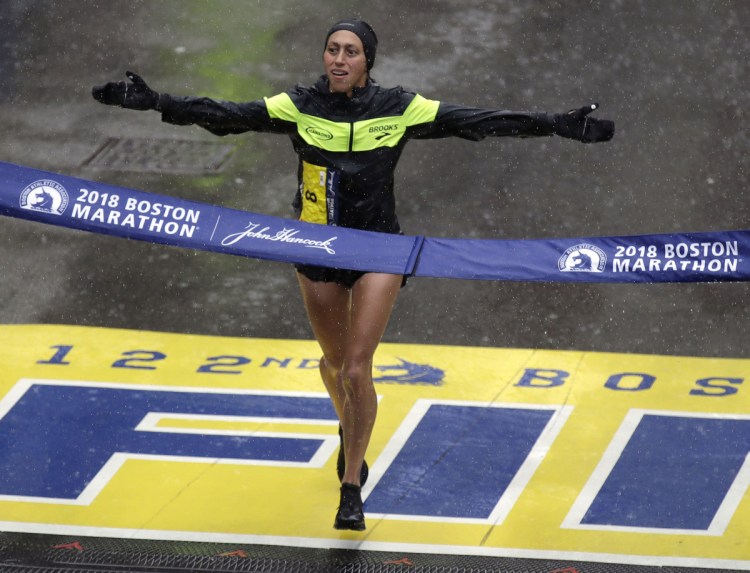 Desiree Linden of Washington, Mich. wins the women's division of the 122nd Boston Marathon on Monday. She is the first American woman to win the race since 1985.