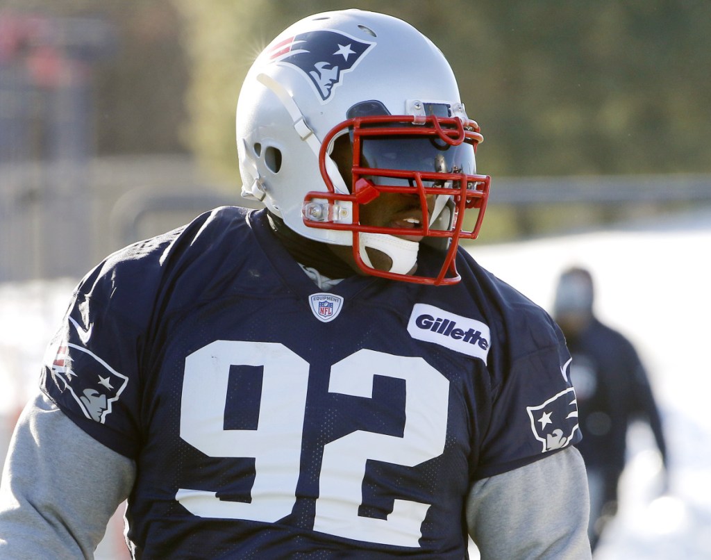 New England Patriots linebacker James Harrison runs through a drill during a practice in December 2017. The 39-year-old announced his retirement Monday. (AP Photo/Bill Sikes)
