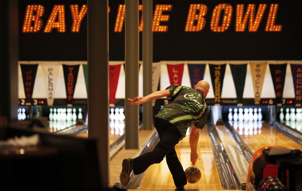 Local bowler Jimmy Clark unfurls a delivery at Bayside Bowl on Tuesday as one of six local bowlers facing PBA pros during a single-elimination tournament. Clark – and the other five locals – were beaten by a PBA bowler as part of the Maine Shootout with local amateurs taking on pros.