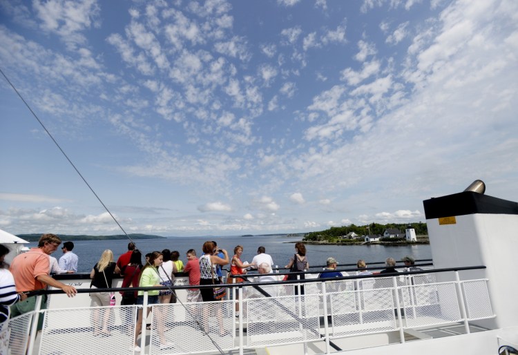 The ferry travels to Lincolnville in 2014. Starting May 21, the Maine State Ferry Service will institute a flat-fee pricing structure, modernizing an antiquated system based on travel distance.