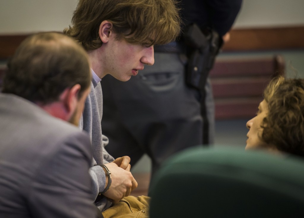 Jack Sawyer, center, shown in Vermont Superior Court on Tuesday, has pleaded not guilty to planning a school shooting at Fair Haven Union High School.