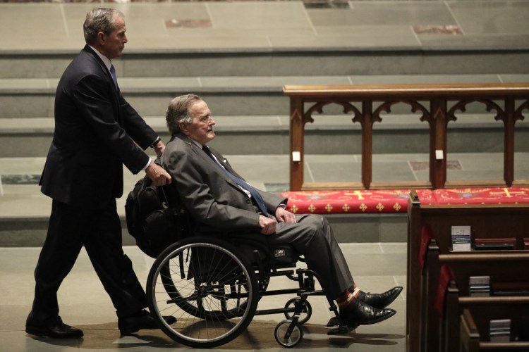 Former Presidents George W. Bush, left, and George H.W. Bush arrive at St. Martin's Episcopal Church on Saturday for the funeral of Barbara Bush. The elder Bush was hospitalized Sunday.