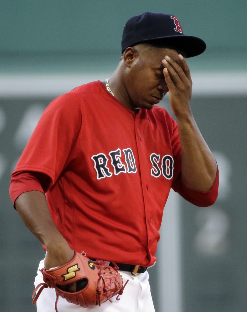 Pitcher Roenis Elias reacts during the first inning of a game against the Seattle Mariners at Fenway Park in June 2016. (AP Photo/Elise Amendola)