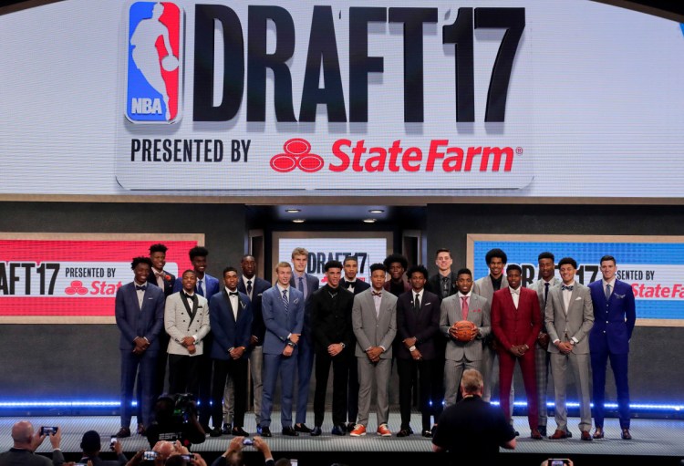 Top draft prospects gather in June 2017 for a group photo before the NBA basketball draft in New York. 