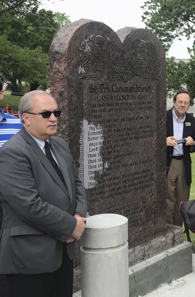 Arkansas officials unveil a Ten Commandments monument outside the  Capitol in Little Rock on Thursday.