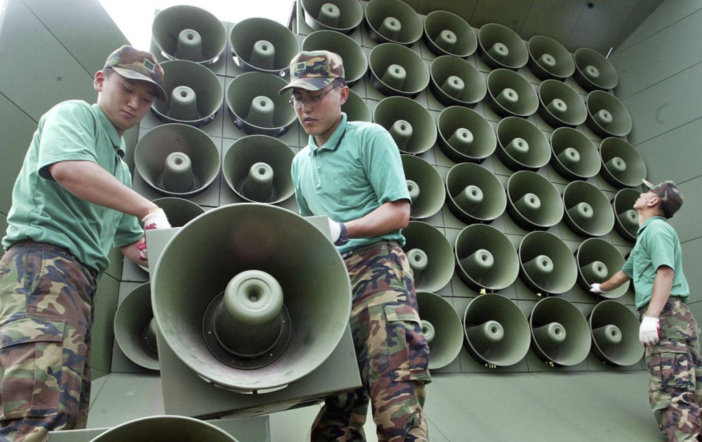 South Korean army soldiers remove loudspeakers used for propaganda broadcasts near the Demilitarized Zone between South and North Korea in Paju, South Korea.