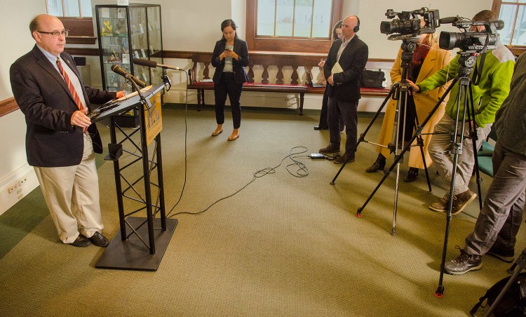 Secretary of State Matt Dunlap talks to reporters about the Maine Supreme Judicial Court's ruling on ranked-choice voting on Wednesday at the Maine State House in Augusta. 