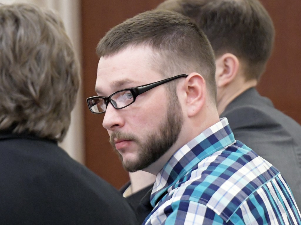 Timothy S. Danforth, 26, of Wilton, confers with his attorney, Sarah Glynn, while entering a plea of manslaughter Monday at the Capital Judicial Center in Augusta. Danforth entered the plea stemming from charges related to the death of Michael Reis.
