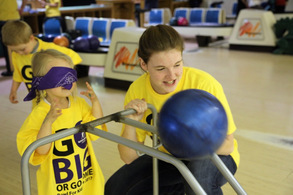 Big Sister Brittany Kimball, right, and her Little Sister Faith Wentzell support the agency that brought them together by bowling at last year's Bowl for Kids' Sake in Hallowell. Money raised at the event helps fund one-to-one mentoring programs that support 250 youth in Kennebec Valley.