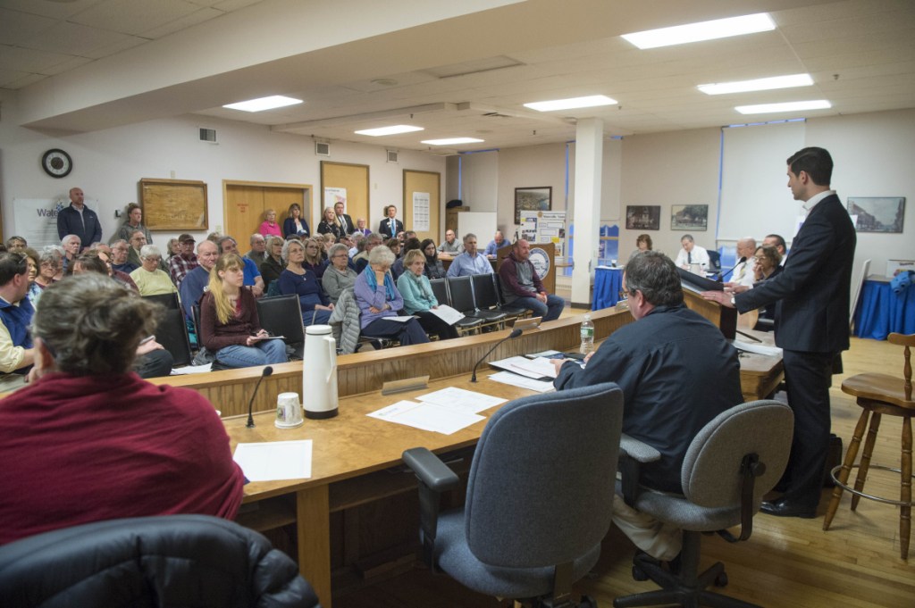 Waterville Mayor Nick Isgro opens the City Council meeting Tuesday in the council chamber in Watervile. In the first of two votes, the council approved funding construction of a boardwalk at Head of Falls.