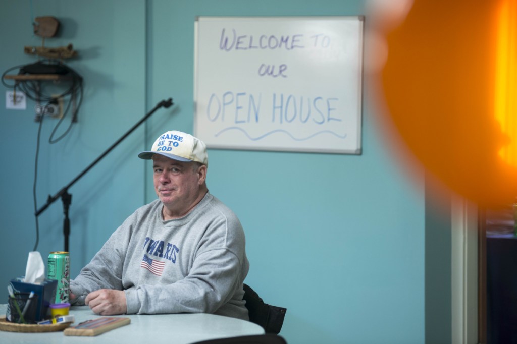 Howard Edwards enjoys snacks Thursday at an open house for the new National Alliance on Mental Illness peer recovery center in Waterville. The center offers support groups and classes to help those confronted by mental health or substance abuse challenges.