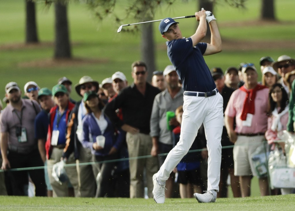 Jordan Spieth hits a shot on the 17th hole during the first round at the Masters on Thursday in Augusta, Georgia.