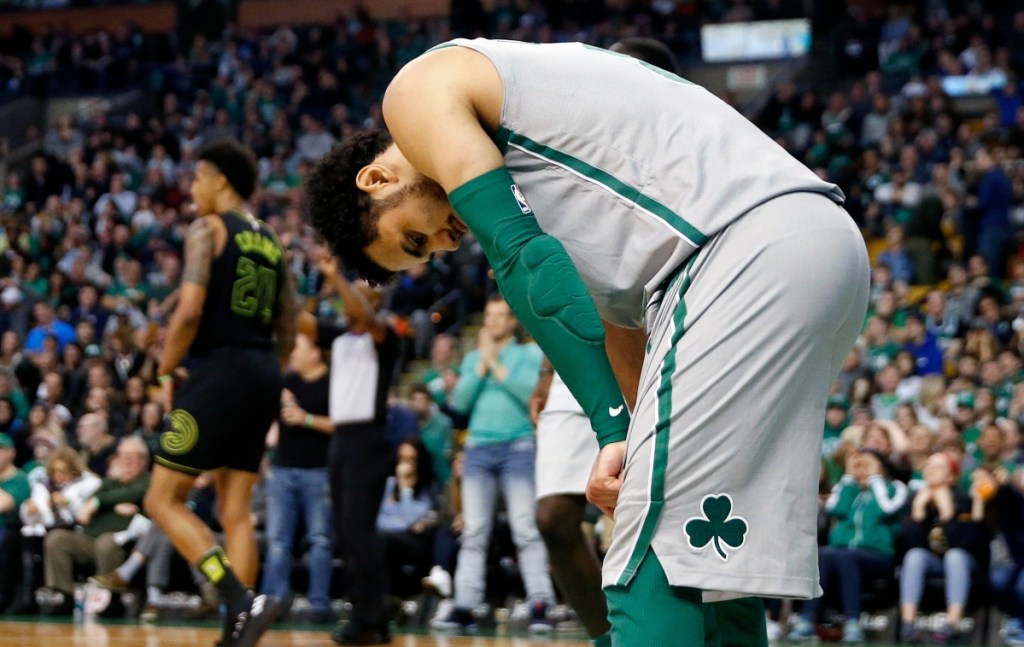 Boston's Shane Larkin reacts after missing a layup during the fourth quarter against Atlanta on Sunday in Boston.