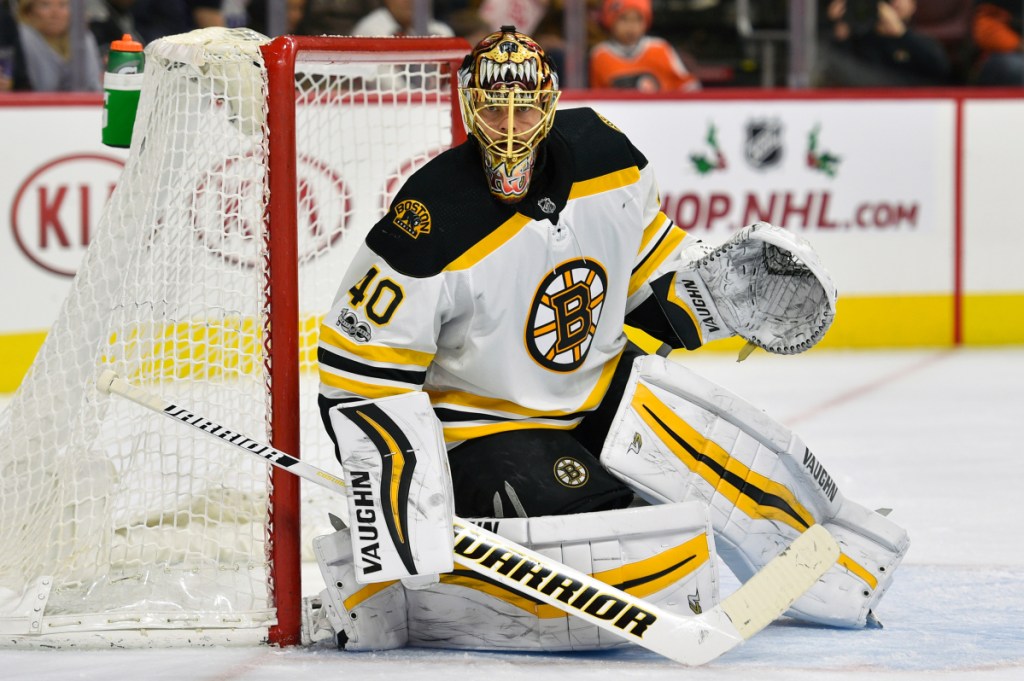 In this December 2017 photo, Boston Bruins goalie Tuukka Rask looks for a loose puck during the second period of a game against the Philadelphia Flyers, in Philadelphia. Rask and Toronto Maple Leage counterpart Frederik Andersen have near identical save percentages at .918 and .917, respectively.