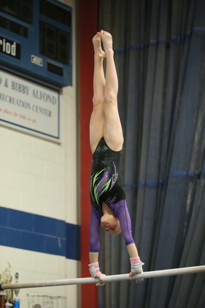 Mylee Grant performs a routine on the bars recently.