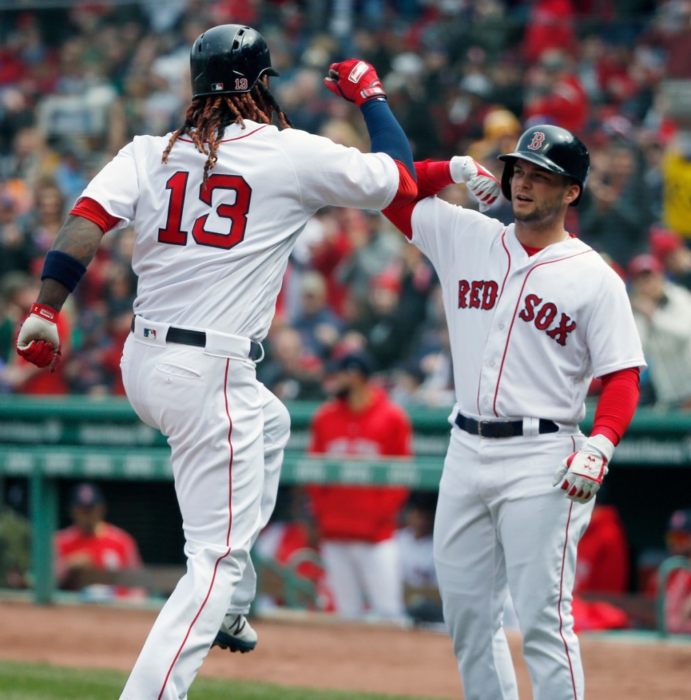 AP photo
Boston Red Sox first baseman Hanley Ramirez (13) celebrates his two-run home run that also drove in Andrew Benintendi, right, during the first inning Saturday against the Baltimore Orioles in Boston.