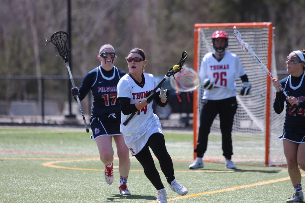 Thomas senior Kimberly Banks looks for a teammate to pass to during a game earlier this season.