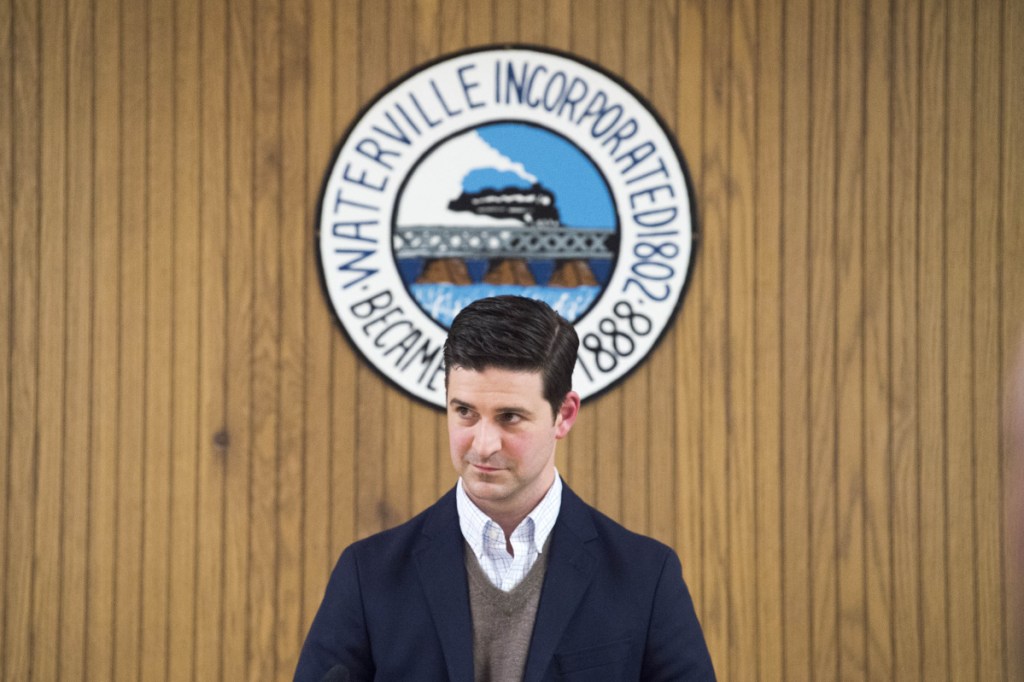 Mayor Nick Isgro stands at the podium during a City Council meeting in Waterville on Tuesday.