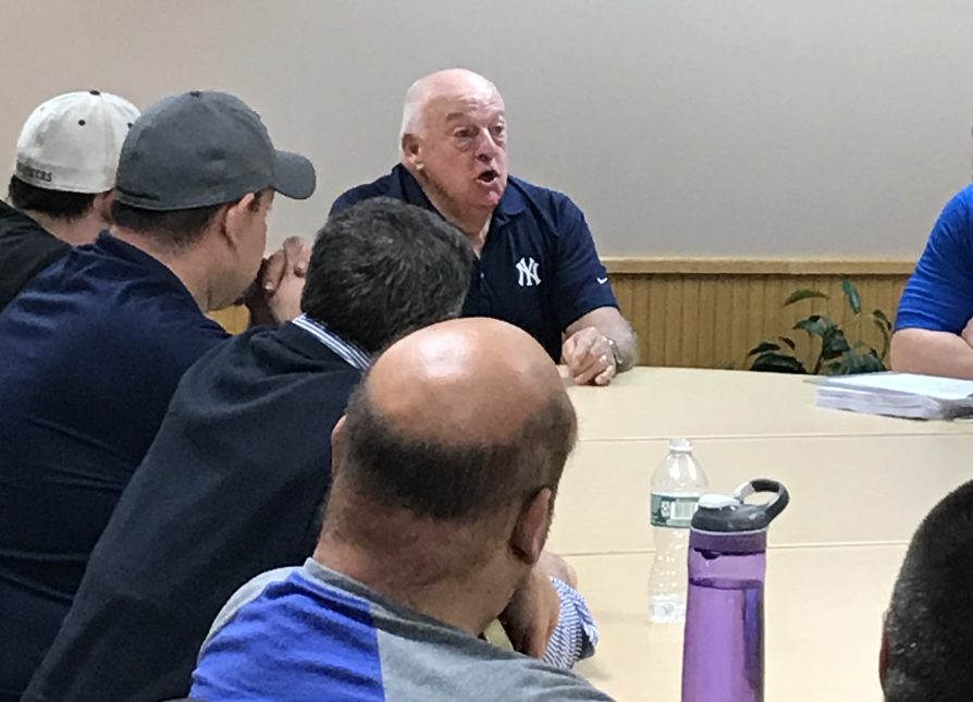 Maine native and former New York Yankees manager Stump Merrill speaks to a group of Cal Ripken League coaches Tuesday night in Waterville. Merrill is concerned that fewer children are playing baseball nationwide.