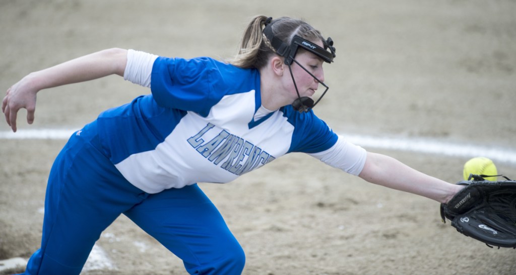 Lawrence pitcher Sam Marshall tries to field a hard hit ground ball by Maine Central Institute on Friday in Fairfield.