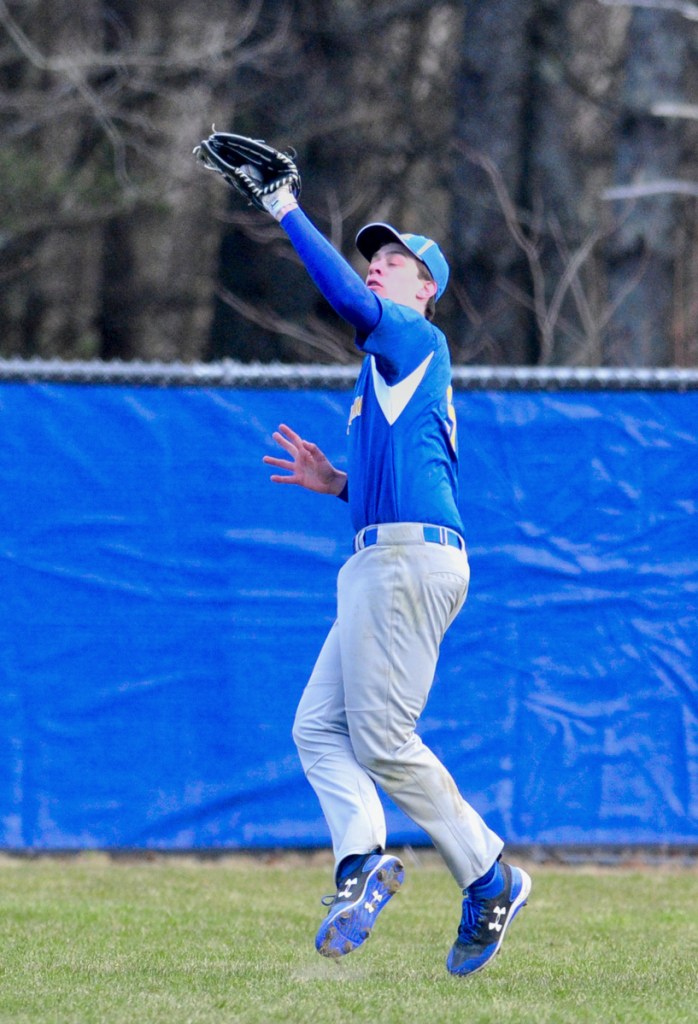 Mt. Abram center field Jack Deming catches a pop fly against Oak Hill on Friday in Wales.