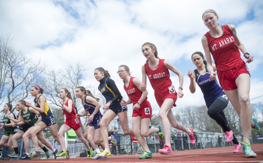 Runners from several high schools leave the starting line for the 1,600-meter run at the Waterville Relays on Saturday in Waterville.
